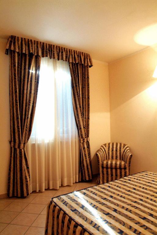 Hotel La Maddalena Quattro Castella Cameră foto